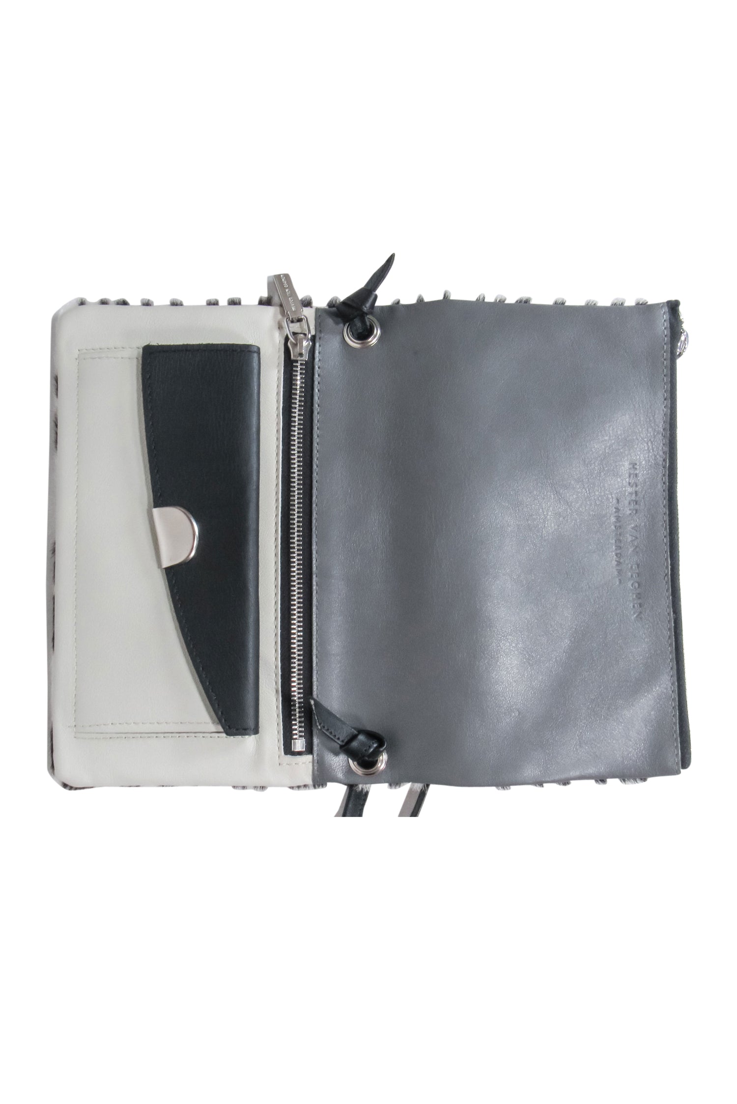 Hester van Eeghen Ivory & Black Zebra Print Fold-Over Crossbody Bag: Unleash Your Wild Side