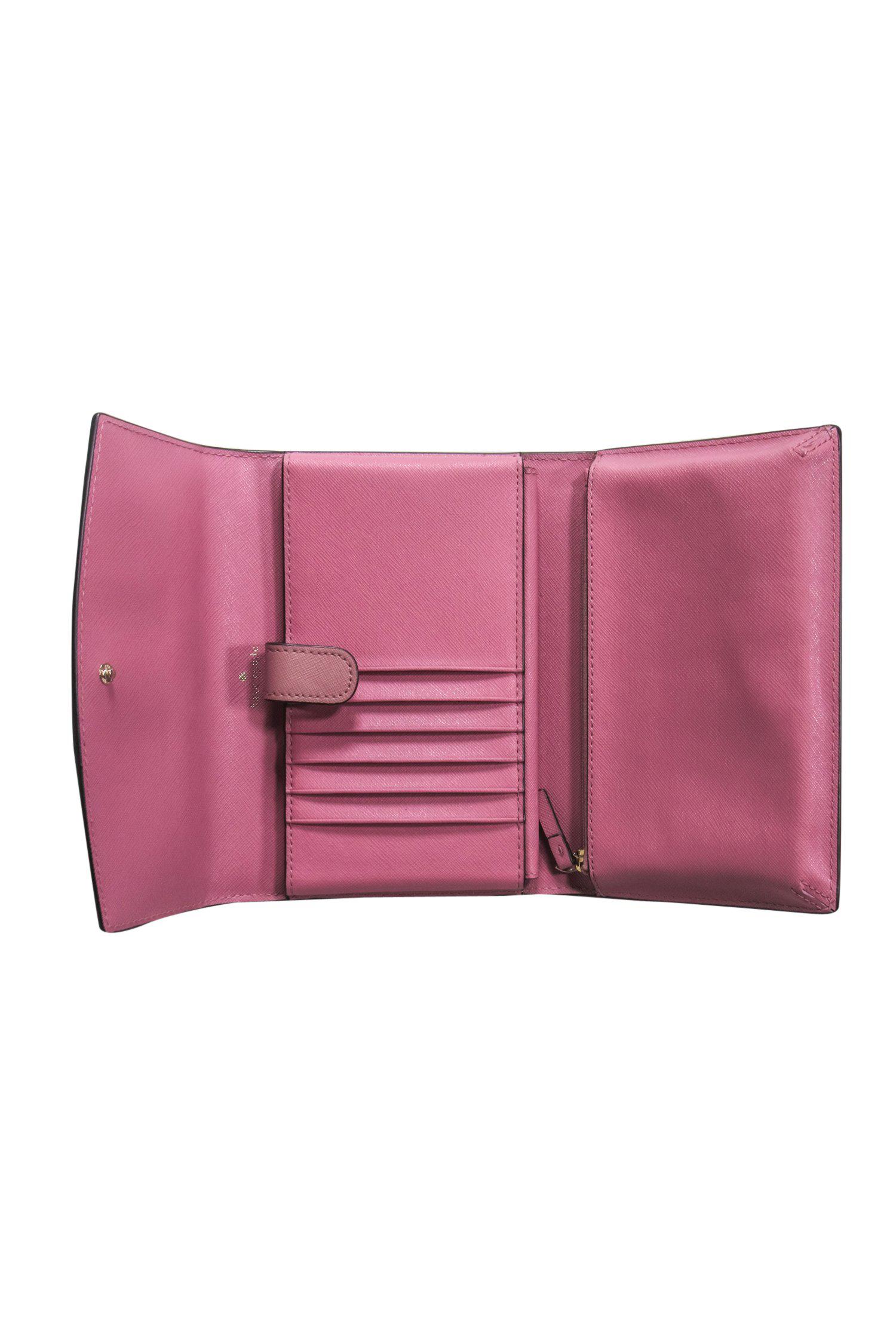 Kate Spade Mauve Textured Leather Crossbody Wallet - The Ultimate Travel Companion