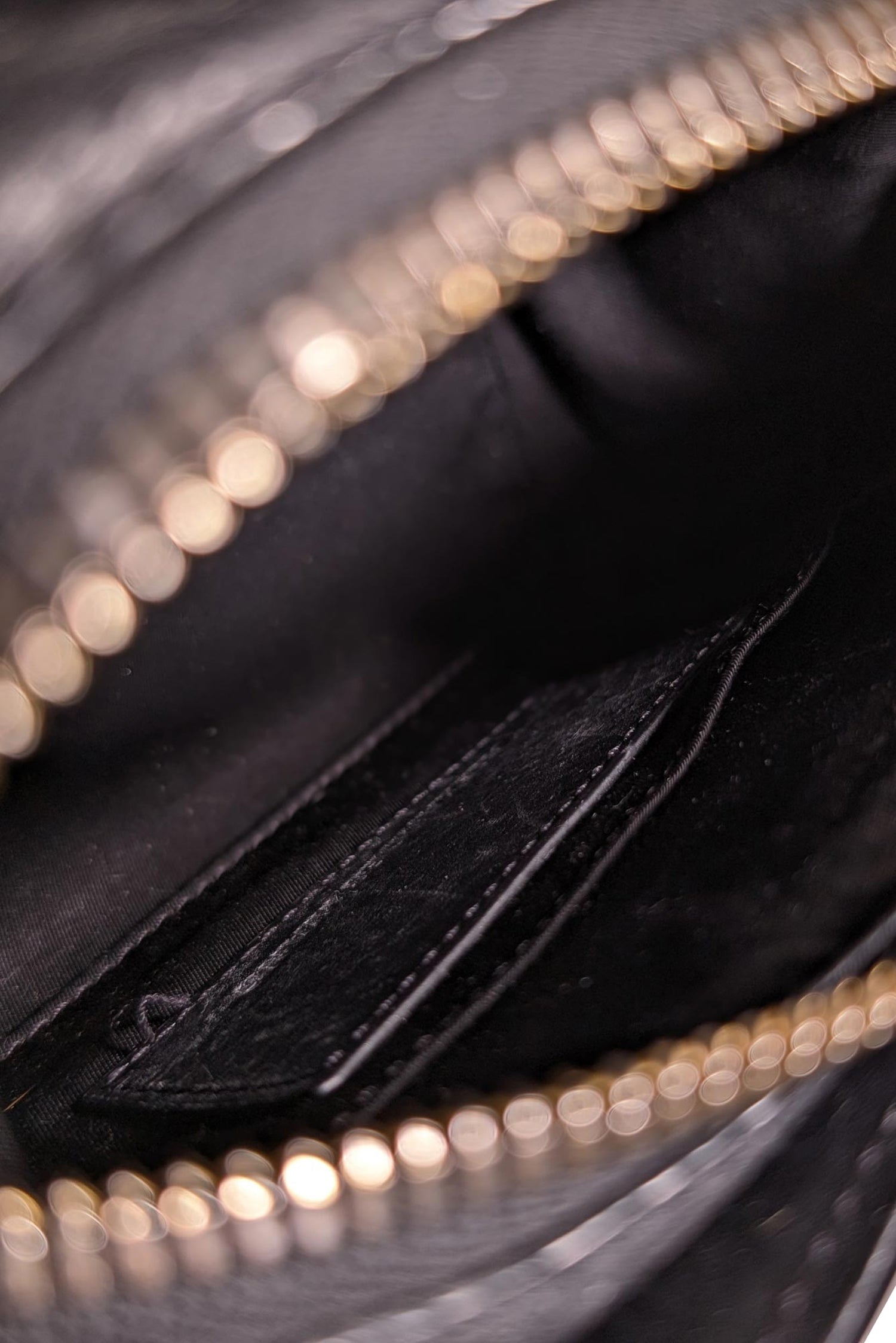 Alexander Wang's Edgy Black Leather Crossbody Bag with Gold Hardware