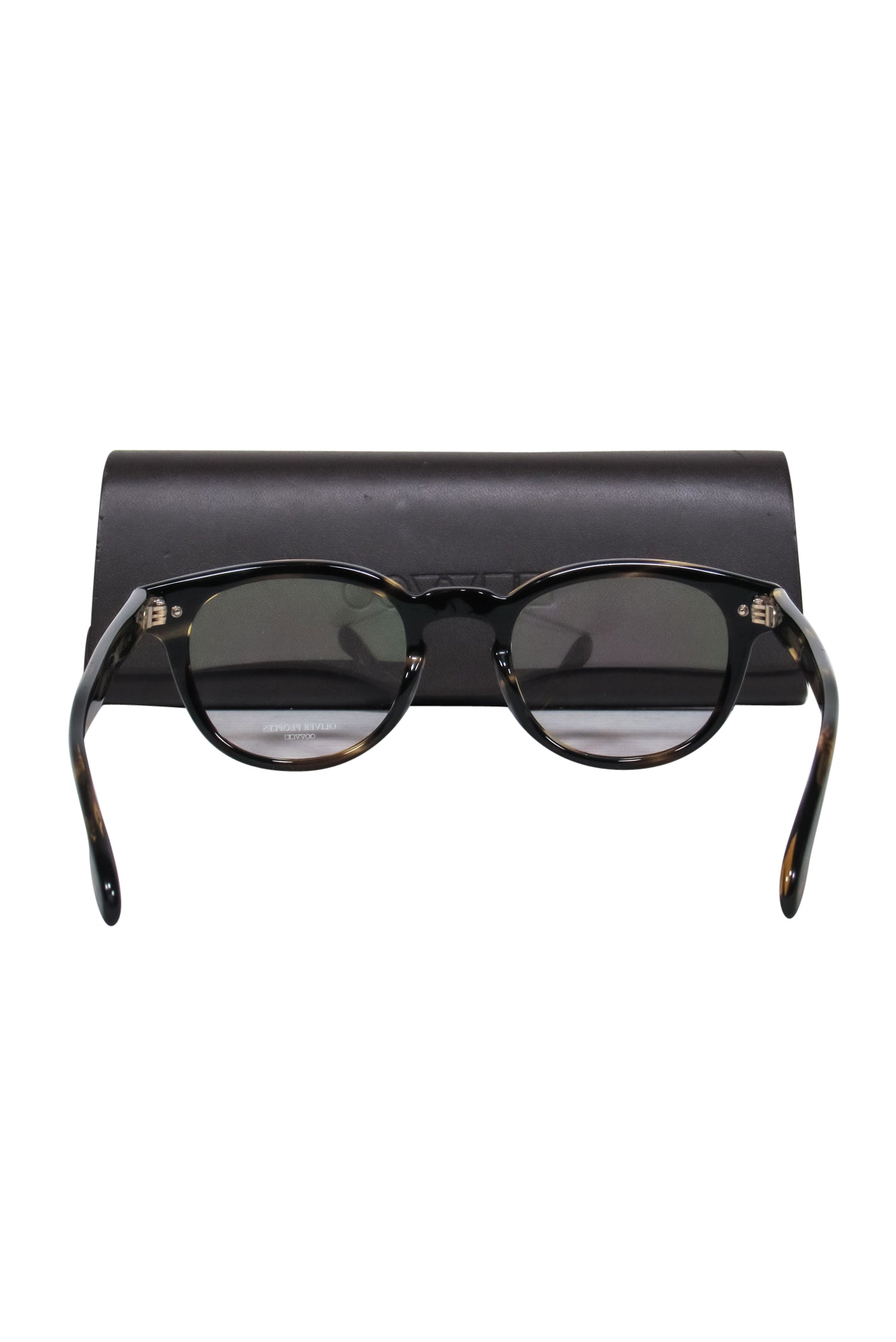 Oliver Peoples Brown Tortoise Shell Round Clear Glasses: A Fashion Statement!