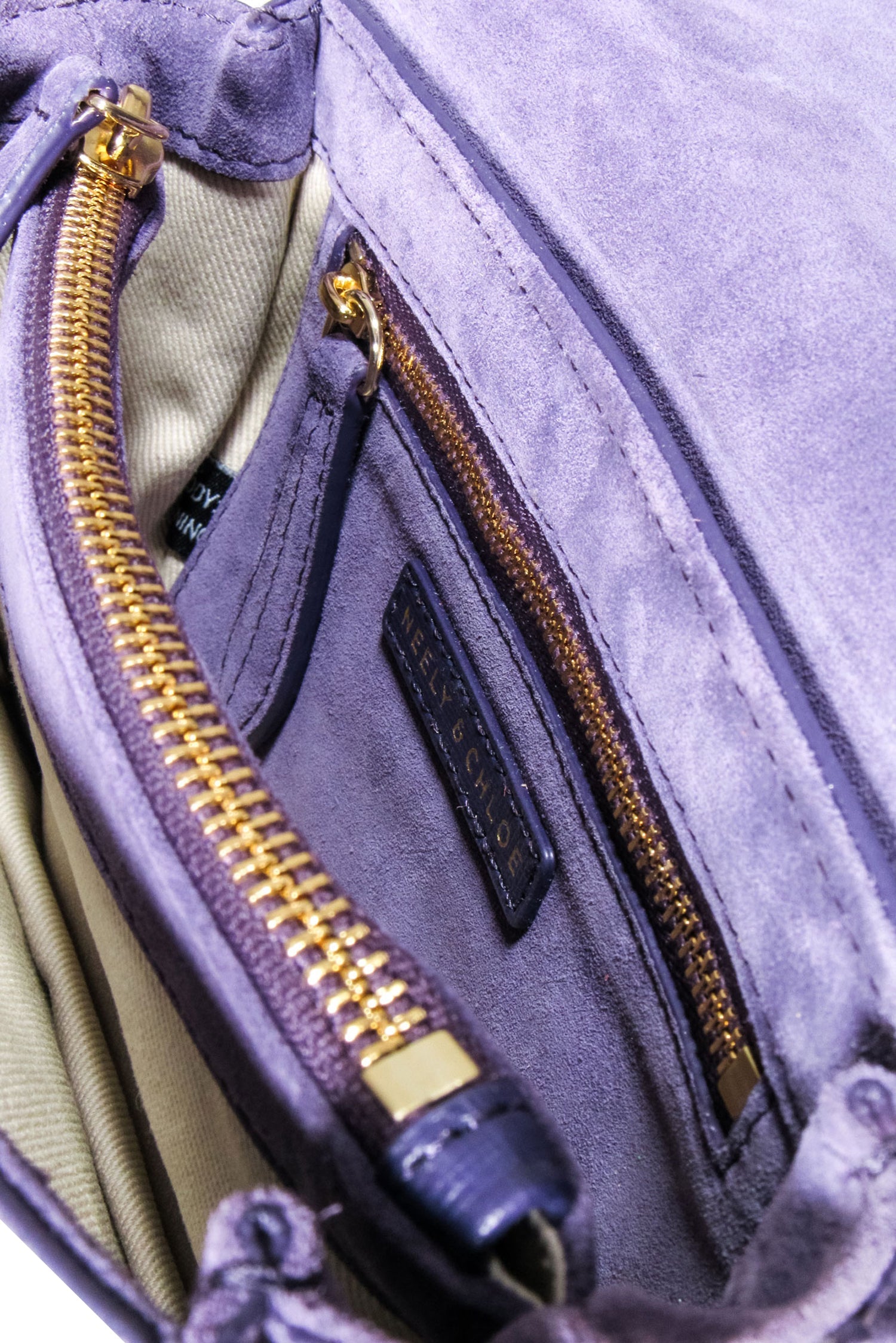 Neely & Chloe's Stunning Lavender Suede Crossbody Bag