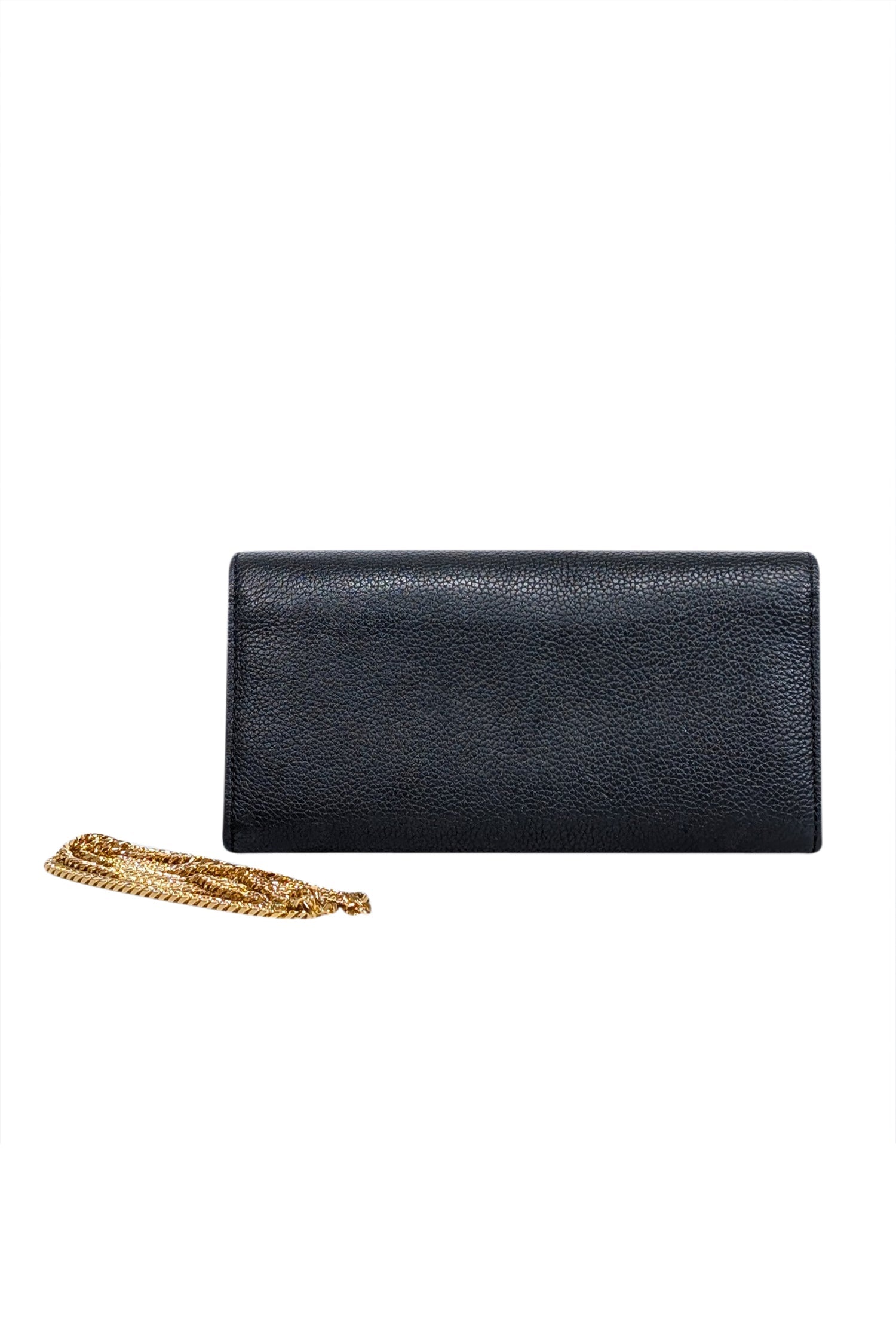 Alexander McQueen's Chic Black Leather Clutch with Stunning Gold Skull Closure