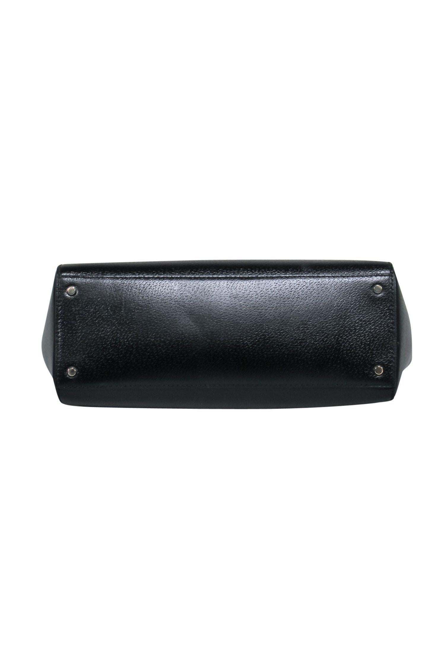 Kate Spade's Stylish Black Leather Zipper Tote with Laptop Sleeve