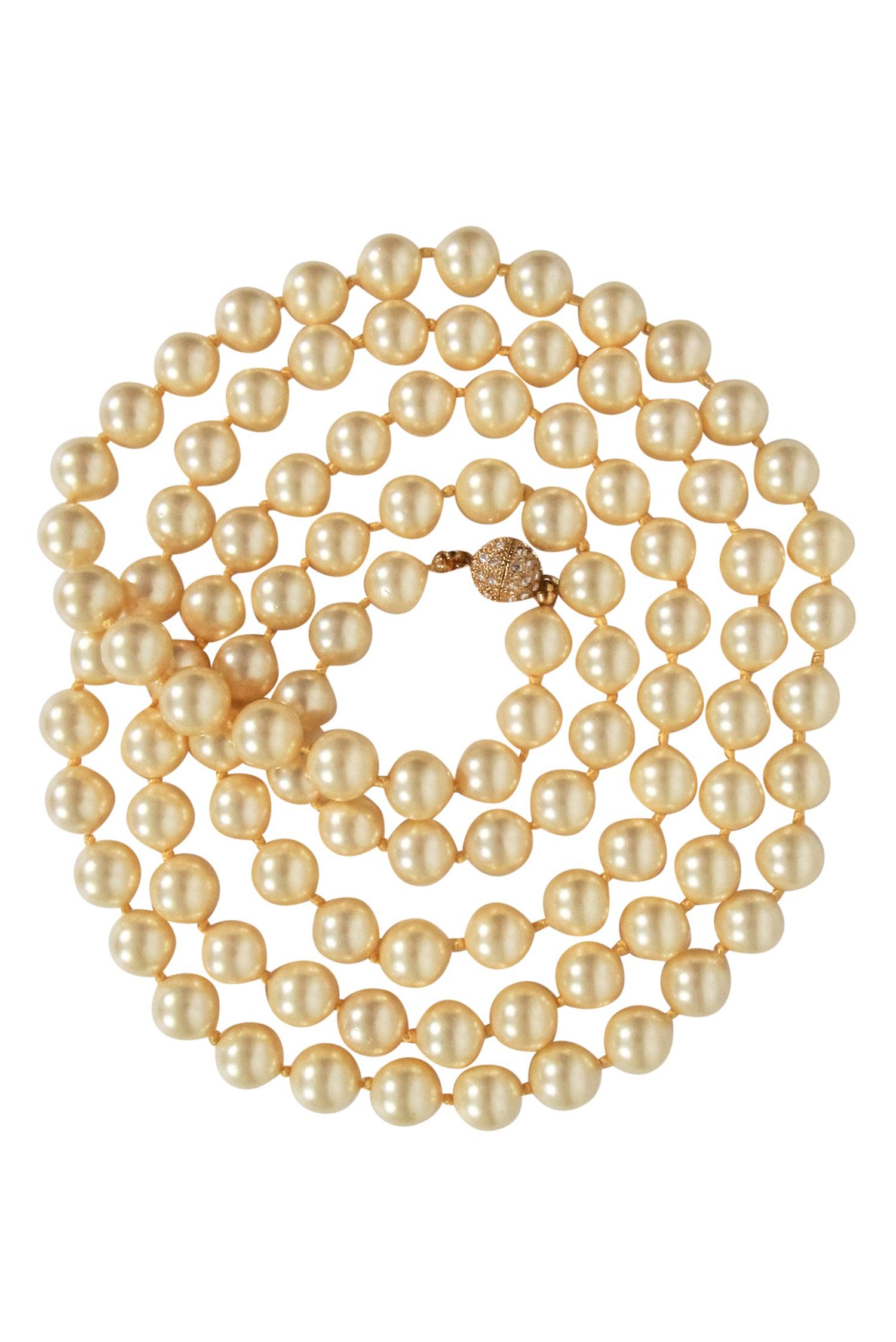 Patty Tobin's Glamorous Pearl Strand Necklace with Sparkling Rhinestone Clasp