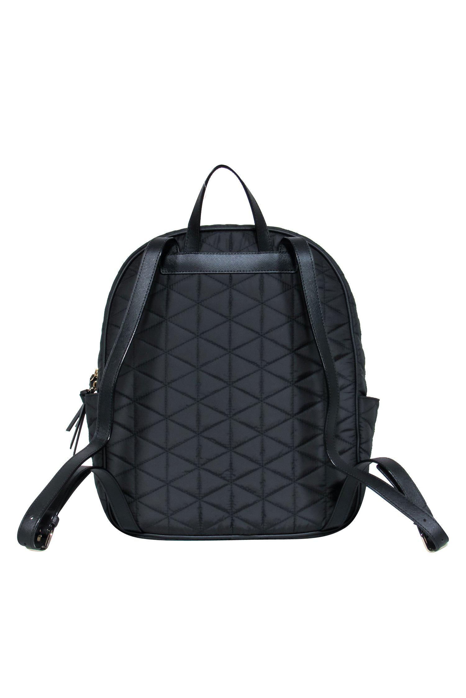 Kate Spade's Stunning Black Quilted Nylon Backpack - Your Ultimate Travel Companion!