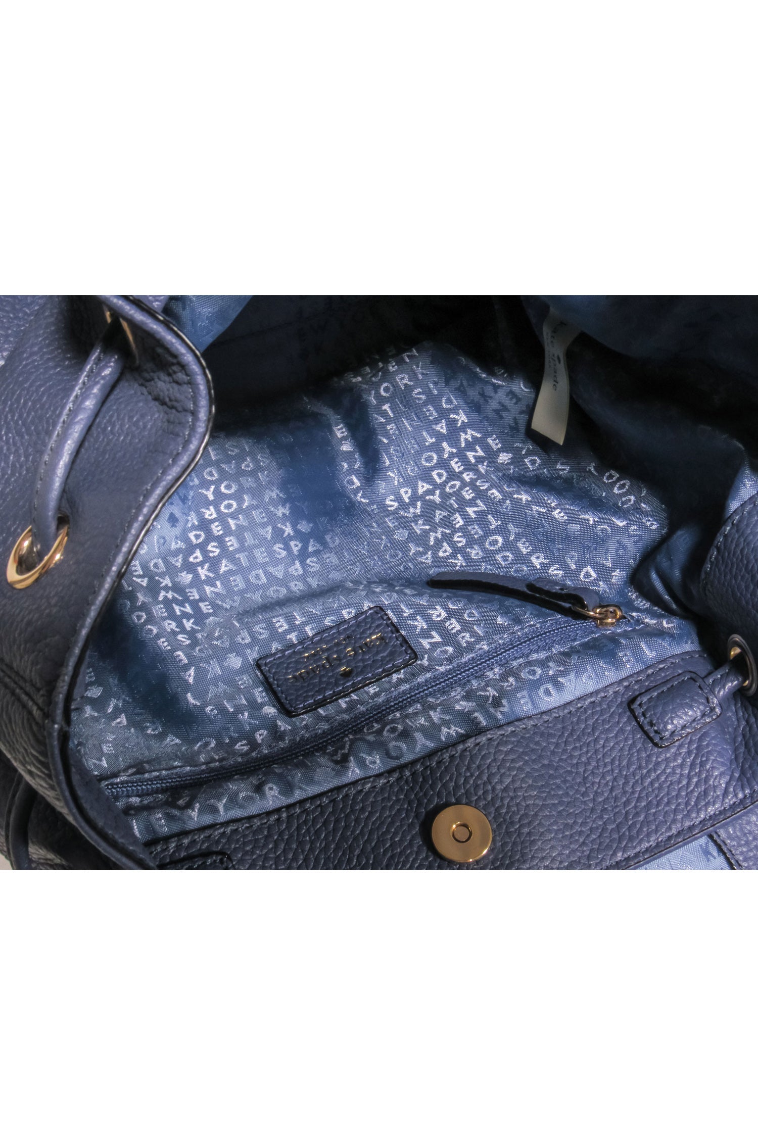 Kate Spade Navy Leather Fold-Over Mini Backpack: A Chic Companion