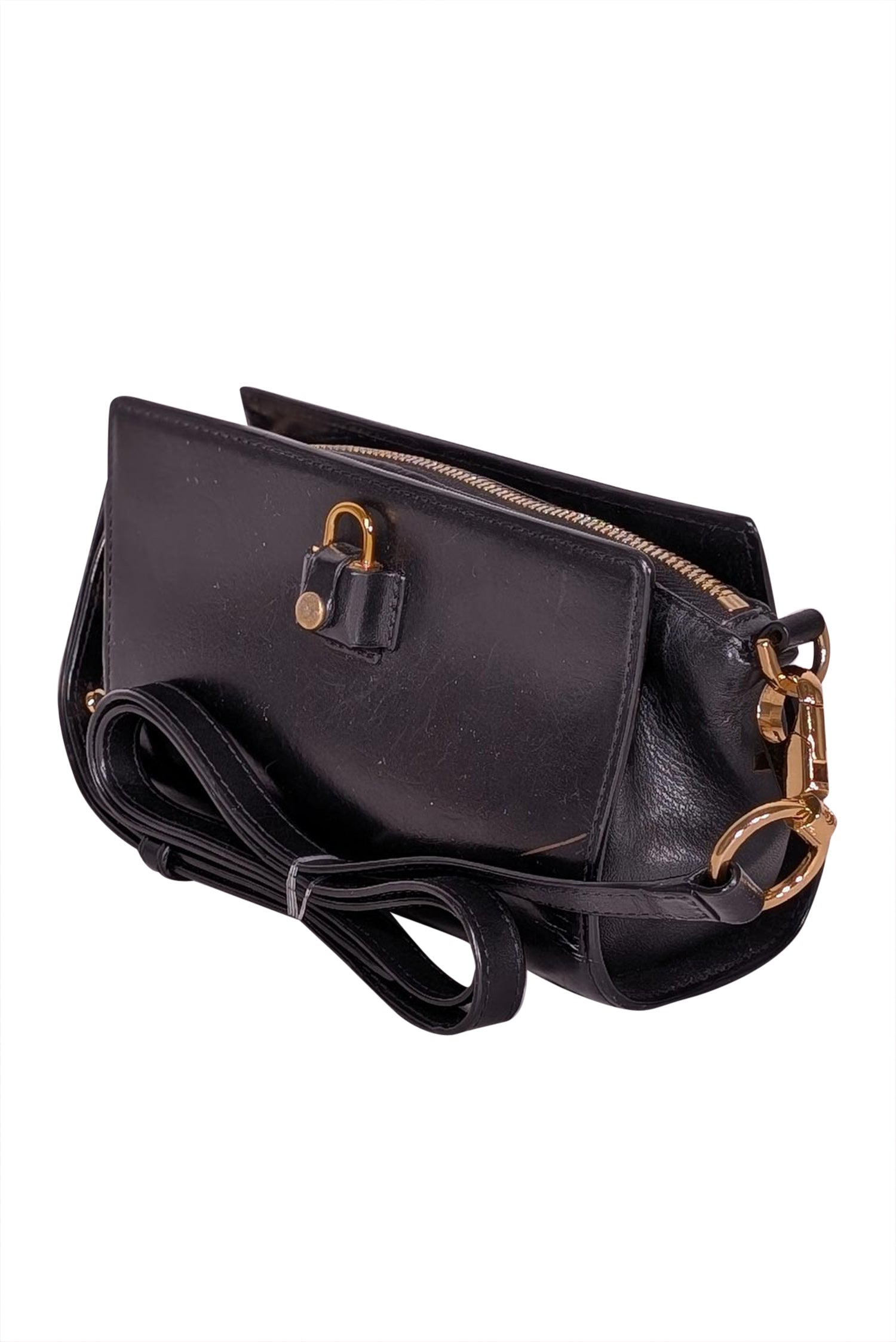 Alexander Wang's Edgy Black Leather Crossbody Bag with Gold Hardware