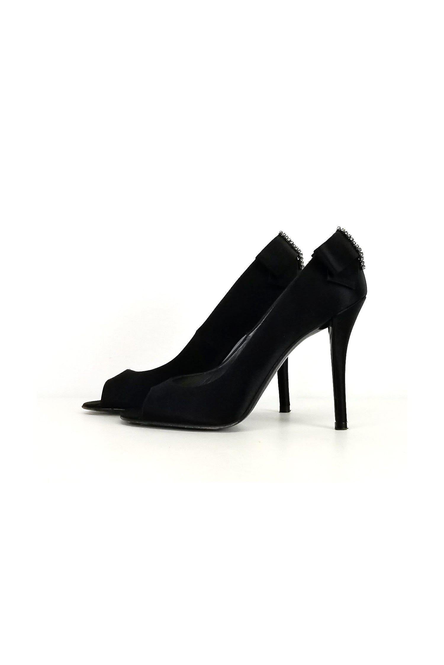 Stuart Weitzman Black Satin Bow Pumps - Size 7 - Elevate Your Evening!